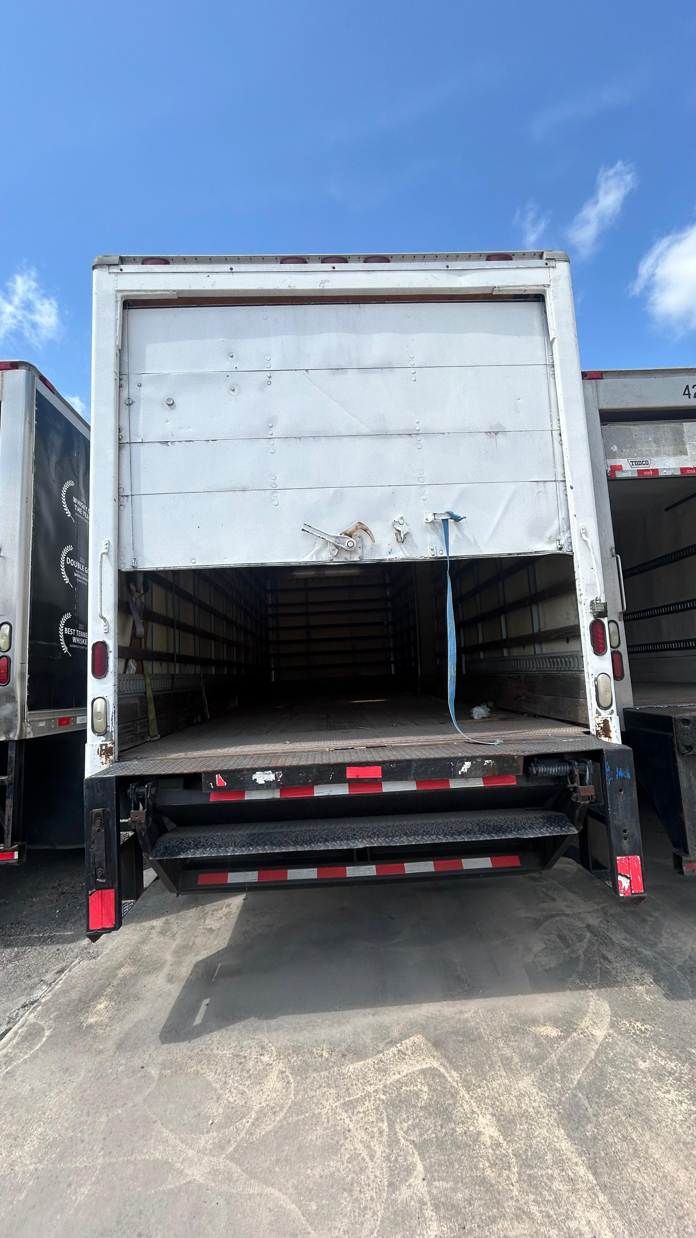 2014 International 24ft Van Box Truck side with MaxxForce badge
