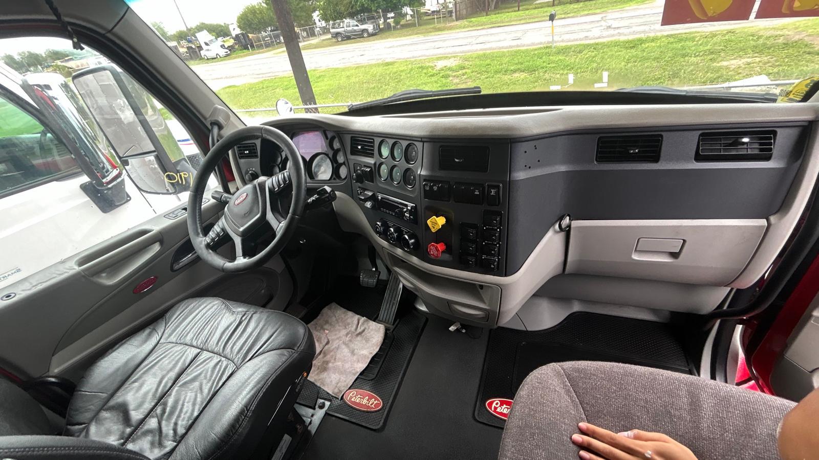 2019 Peterbilt 579 cabin interior with leather driver seat