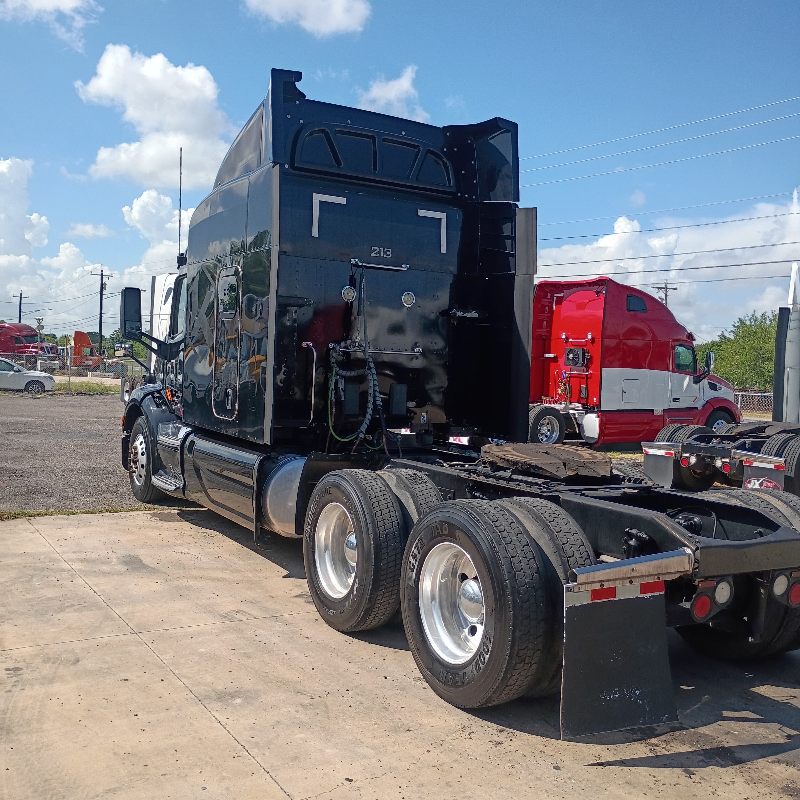 2019 Peterbilt 579 Sleeper rear driver-side quarter view